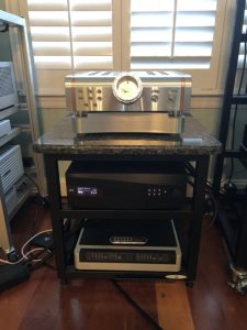 dCS Rossini DAC & Media Streamer w CD Transport under the marble top holding the amplifier